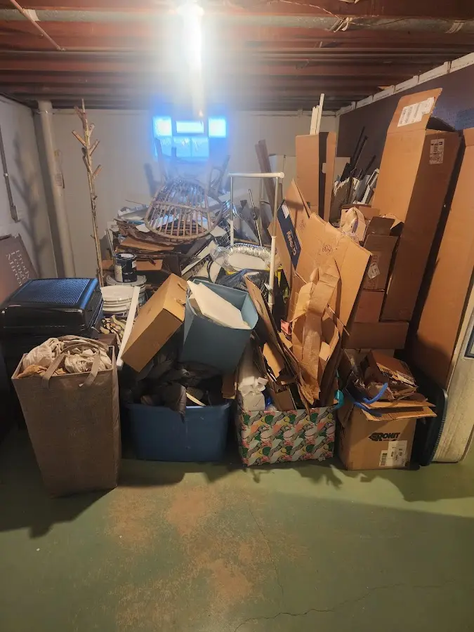 Roll-off dumpster container at job site for Yard Waste Dumpster Rental in Brownfield